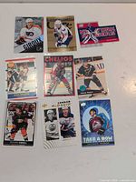 All nine hockey cards laid out in three rows