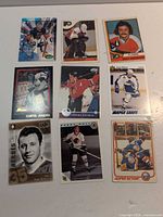 All nine cards laid out front side showing players and titles