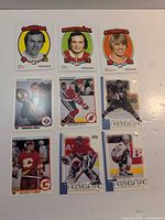 All nine hockey cards laid out in three rows