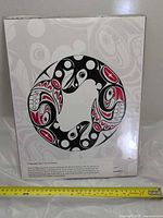 Front view of entire print and measuring tape showing size