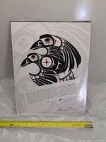 Front view of Len French Haida Raven art print with tape measure for scale