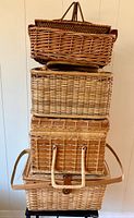 Stack of five rectangular wicker baskets