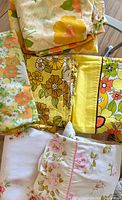 Stack of all linens showing colour and patterns