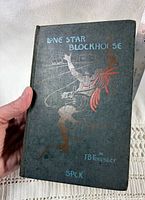 Front cover showing title, illustration, and cloth binding