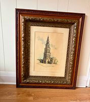 Front view of framed ink and watercolor artwork