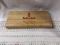 Closed wooden case top showing Haddon Hall Sheffield England Eaton’s Canada branding