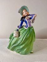Front view of Royal Doulton Autumn Breezes figurine