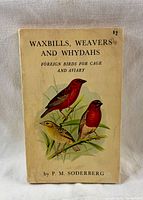 Front cover showing title, author, price and bird illustrations