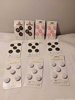 All 10 button packages laid out