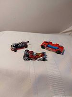 All three Hot Wheels cars on display