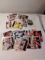 Spread of assorted NHL trading cards displaying fronts of various players