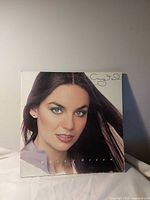 Front album cover with artist photo and title