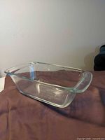 Overview of clear glass loaf pan showing shape and handles