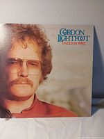 Front album jacket showing title, artist