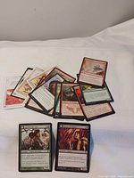 Front view with two highlighted double-faced cards and stack behind