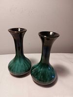 Pair of matching Blue Mountain Pottery bud vases, showing overall form and glaze