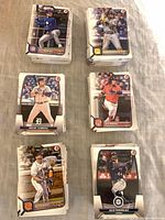 Six visible stacks with sample front faces of cards (Julio Rodriguez, Pete Alonso, Miguel Cabrera, Jeter Downs)