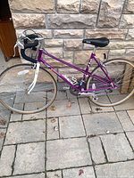 Full left-side view of Absolute purple road bike