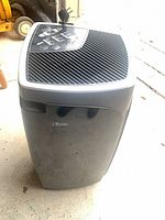 Front view of black Garrison dehumidifier