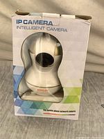 Front of retail box showing Konlen camera through window