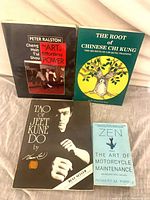 Group view of all four paperback books