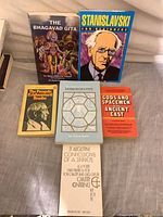 All six books front covers visible