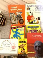 Front covers of all seven paperback books