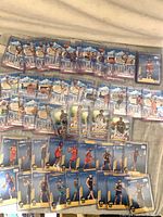 Overhead shot showing entire assortment of sleeved Skyview, Pure Players and Arriving Now insert cards