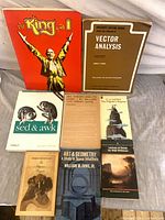 Group shot of all 8 paperback books