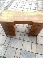 Front view of vanity showing six drawers and knobs