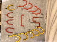 All 16 hooks laid out showing quantity, colors and shapes