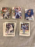 Five stacks of Topps Holiday baseball cards front view