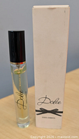 Front view of perfume atomizer and box