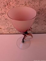 Top view of pink art glass bowl showing interior color and rim