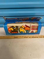 Front of Li’l Playmates boxed set showing contents