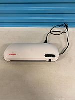 Top view of Staples OL265M laminator with power cord