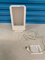 Front view of Verilux HappyLight VT15 lamp and power cord