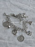Full view of bracelet showing chain and attached charms