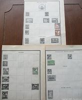 Overview of three album pages showing distribution of stamps