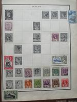 Full Scott album page with Ceylon stamps
