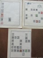 Overview of three album pages showing Madagascar, Sweden and Straits Settlements stamps