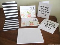 Group of assorted note cards and envelopes