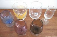 Front view of six stemmed glasses