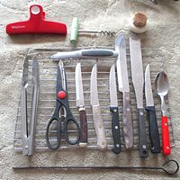 All items laid out on baking rack and carpet