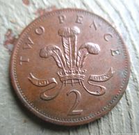 Reverse view showing Prince of Wales feathers, legend TWO PENCE and numeral 2