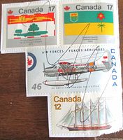 Group shot of all four Canadian stamps