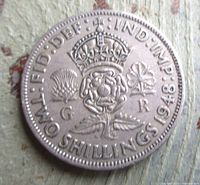 Reverse of 1948 two shillings coin showing crowned Tudor rose and inscription