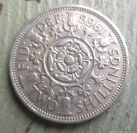 Reverse of 1966 two shillings coin showing crowned Tudor rose and denomination