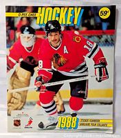 Front cover of 1988 O-Pee-Chee Hockey Sticker Album featuring Chicago player in red jersey with price 59¢