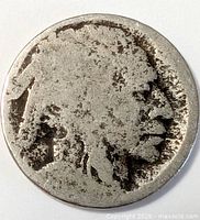 Obverse view of Buffalo nickel with worn Native American profile